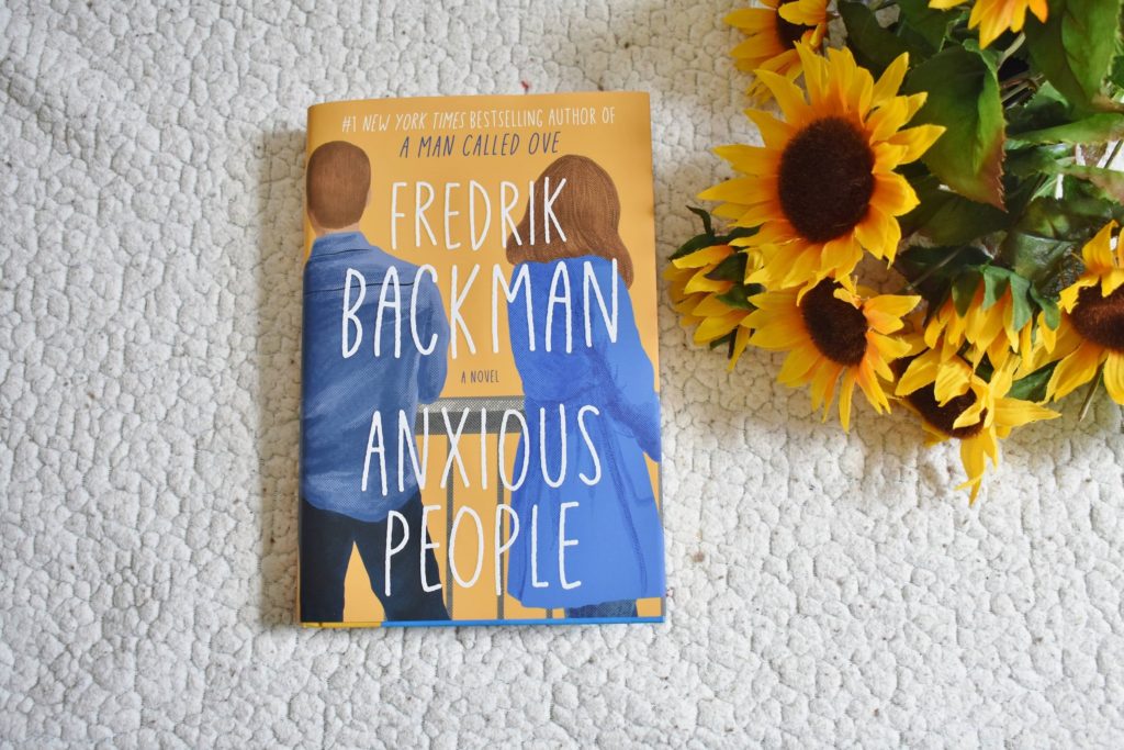 Anxious People book and sunflowers